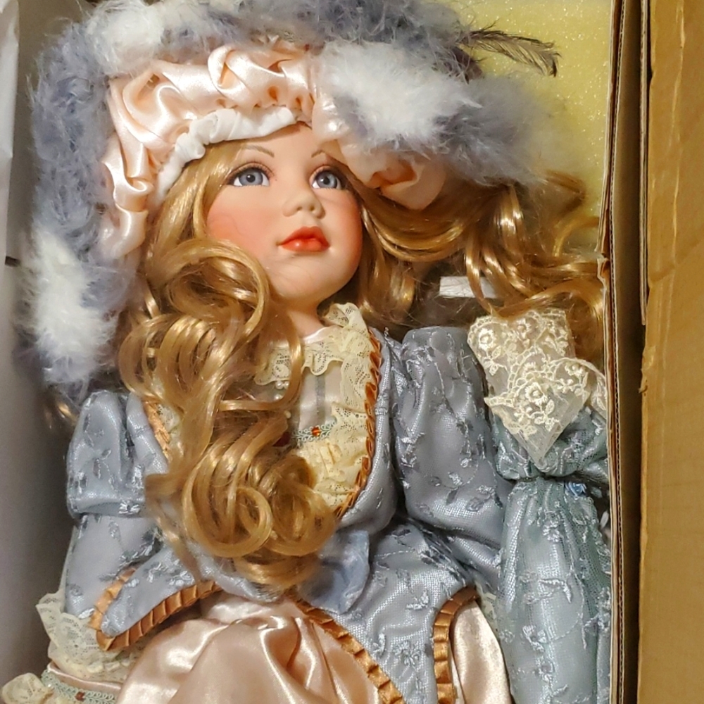 Porcelain doll with stand